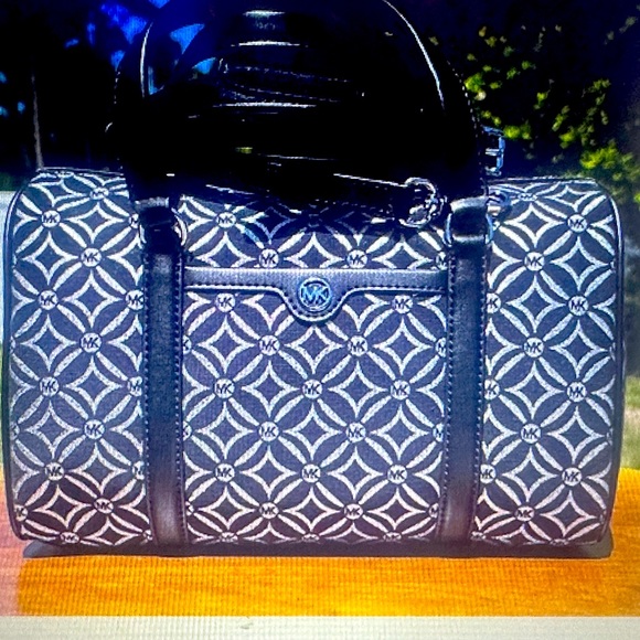 Michael Kors Black and silver Patterned duffle crossbody - Picture 1 of 11